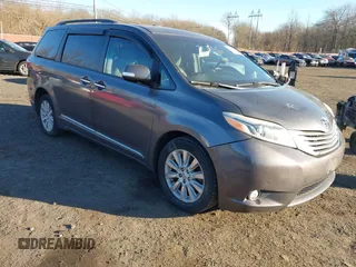 2015 Toyota Sienna Ltd with VIN 5TDDK3DC5FS096649, listed as a IAAI auction lot 41292478 with 234,298 mi miles. Bid and sale history available at carsss.com. Image 1.