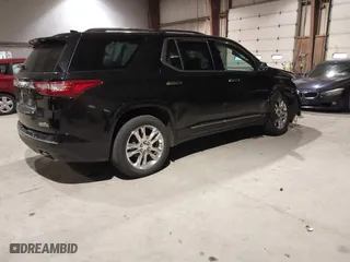 2021 Chevrolet Traverse High Country with VIN 1GNEVNKW9MJ150993, listed as a IAAI auction lot 41224329 with 100,425 mi miles. Bid and sale history available at carsss.com. Image 4.