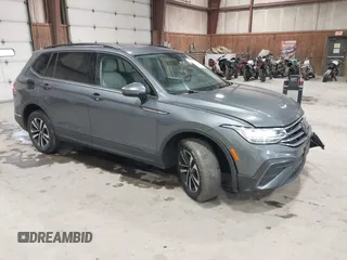 2022 Volkswagen Tiguan S z VIN 3VV0B7AX2NM042934, wystawiony jako IAAI lot #42172199 z przebiegiem 71 367 mil mil oraz . Historia ofert i sprzedaży dostępna na DreamBid. Obrazek 1.