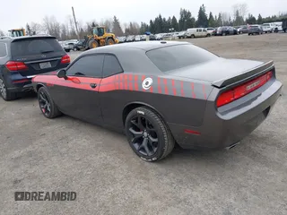 2014 Dodge Challenger R/T Plus z VIN 2C3CDYBT1EH177266, wystawiony jako IAAI lot #41798977 z przebiegiem 109 489 mil mil oraz . Historia ofert i sprzedaży dostępna na DreamBid. Obrazek 3.