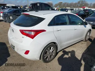 2014 Hyundai Elantra GT with VIN KMHD35LH6EU180152, listed as a IAAI auction lot 41674456 with 113,763 mi miles. Bid and sale history available at carsss.com. Image 4.