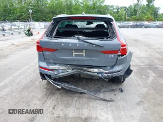 2022 Volvo XC60 Inscription z VIN YV4062RL6N1954497, wystawiony jako IAAI lot #42243369 z przebiegiem 38 043 mil mil oraz . Historia ofert i sprzedaży dostępna na DreamBid. Obrazek 16.