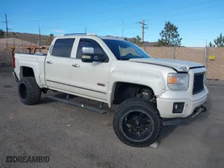 2014 GMC Sierra 1500 SLT with VIN 3GTU2VEC2EG293141, listed as a IAAI auction lot 41607139 with 88,011 mi miles. Bid and sale history available at carsss.com. Image 1.