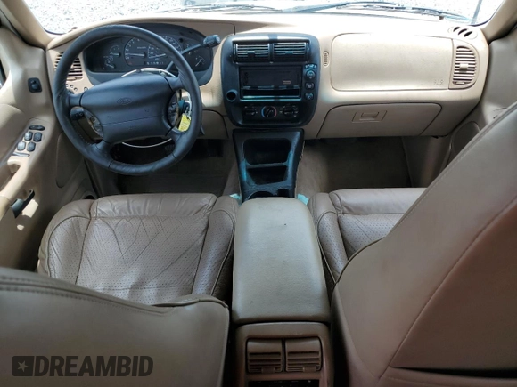 1998 Ford Explorer with VIN 1FMZU32X7WZB87549, listed as a Copart auction lot 60970165 with 186,022 mi miles and Salvage title. Bid and sale history available at DreamBid. Image 8.