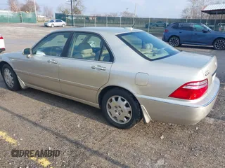 2004 Acura RL w/Navigation System z VIN JH4KA96664C001291, wystawiony jako IAAI lot #41678449 z przebiegiem 83 954 mil mil oraz . Historia ofert i sprzedaży dostępna na DreamBid. Obrazek 3.