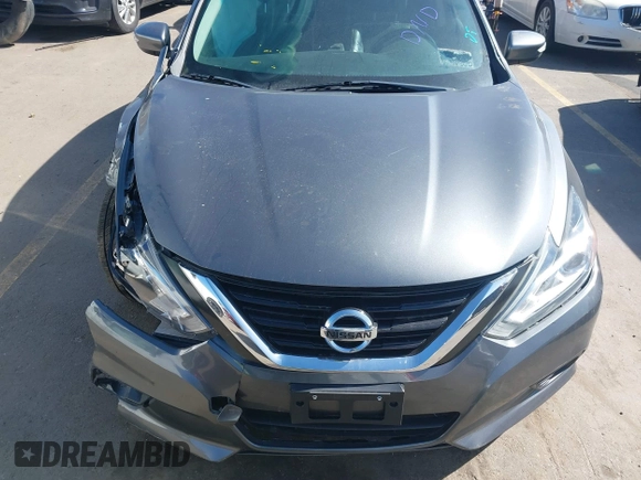 2018 Nissan Altima SR with VIN 1N4AL3AP5JC243138, listed as a IAAI auction lot 41750643 with 123,601 mi miles and . Bid and sale history available at carsss.com. Image 12.
