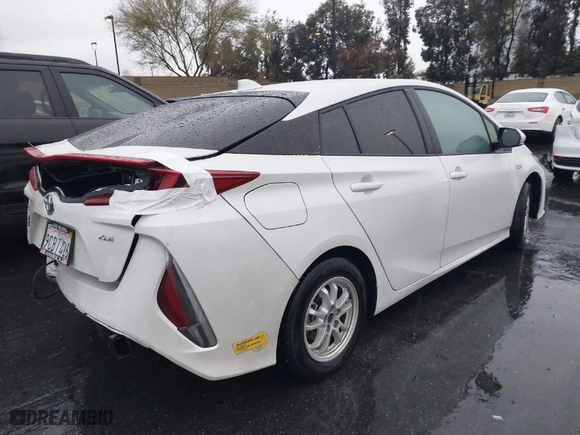 2022 Toyota Prius Prime LE with VIN JTDKAMFP5N3217048, listed as a IAAI auction lot 41687270 with NaN miles. Bid and sale history available at carsss.com. Image 4.