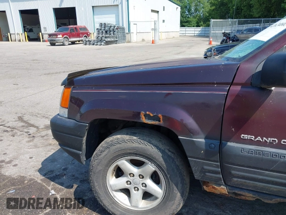 1997 Jeep Grand Cherokee Laredo with VIN 1J4GZ58S0VC708420, listed as a IAAI auction lot 42624603 with Not provided miles and . Bid and sale history available at DreamBid. Image 14.