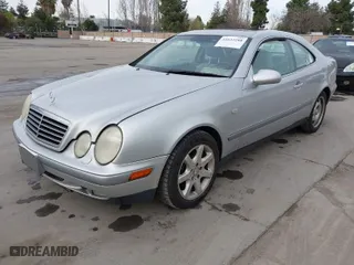 1998 Mercedes-Benz CLK-Class with VIN WDBLJ65G7WF030460, listed as a IAAI auction lot 41633288 with 327,848 mi miles. Bid and sale history available at carsss.com. Image 2.