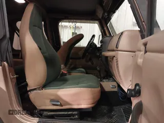 2000 Jeep Wrangler Sahara with VIN 1J4FA59S2YP740431, listed as a IAAI auction lot 41313079 with 183,989 mi miles. Bid and sale history available at carsss.com. Image 5.