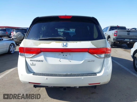 2014 Honda Odyssey Touring with VIN 5FNRL5H97EB037361, listed as a IAAI auction lot 42106742 with 198,279 mi miles and . Bid and sale history available at DreamBid. Image 16.