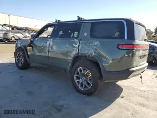 2022 Rivian R1S Launch Edition with VIN 7PDSGABL6NN000590, listed as a Copart auction lot 61510904 with 0 mi miles and Salvage Title. Bid and sale history available at carsss.com. Image 2.