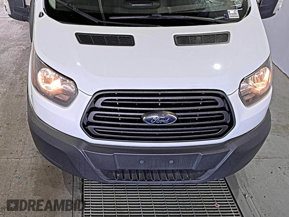 2019 Ford Transit z VIN 1FTYE1YM5KKB87003, wystawiony jako IAAI lot #42610488 z przebiegiem 106 642 mil mil oraz . Historia ofert i sprzedaży dostępna na DreamBid. Obrazek 28.
