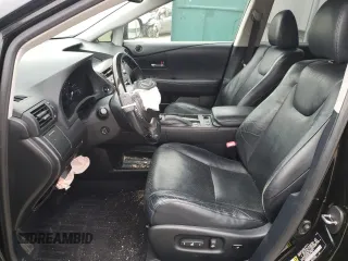2013 Lexus RX 450h with VIN JTJZB1BAXD2412320, listed as a Copart auction lot 77810924 with 140,723 mi miles and Salvage title. Bid and sale history available at DreamBid. Image 7.