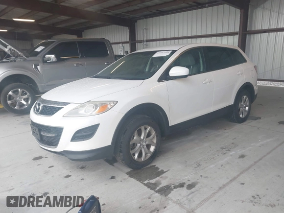 2012 Mazda CX-9 Touring with VIN JM3TB3CV5C0357962, listed as a IAAI auction lot 41997998 with 125,823 mi miles and . Bid and sale history available at carsss.com. Image 2.