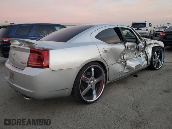 2006 Dodge Charger SRT-8 with VIN 2B3KA73W26H279925, listed as a Copart auction lot 78479574 with 127,443 mi miles and Salvage Title. Bid and sale history available at DreamBid. Image 3.