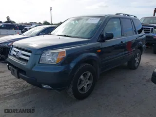 2006 Honda Pilot EX-L with VIN 2HKYF18536H538744, listed as a IAAI auction lot 42025277 with 203,012 mi miles. Bid and sale history available at carsss.com. Image 17.
