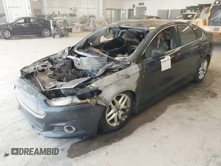 2014 Ford Fusion SE with VIN 3FA6P0HD9ER171307, listed as a IAAI auction lot 41582707 with Not Provided miles and . Bid and sale history available at DreamBid. Image 2.