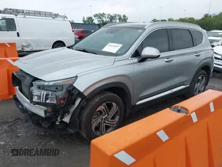 2022 Hyundai Santa Fe SEL z VIN 5NMS34AJ2NH476238, wystawiony jako IAAI lot #42119497 z przebiegiem 23 883 mil mil oraz . Historia ofert i sprzedaży dostępna na DreamBid. Obrazek 19.