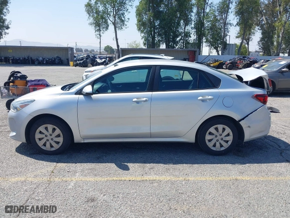 2018 Kia Rio LX with VIN 3KPA24AB4JE086105, listed as a IAAI auction lot 42062323 with 128,289 mi miles. Bid and sale history available at carsss.com. Image 15.