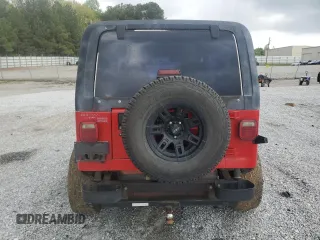 1995 Jeep Wrangler S with VIN 1J4FY19P4SP318216, listed as a Copart auction lot 52751605 with 241,154 mi miles and Salvage title. Bid and sale history available at DreamBid. Image 6.