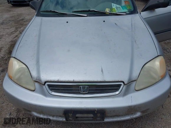 1998 Honda Civic DX z VIN 2HGEJ6525WH562868, wystawiony jako IAAI lot #42382885 z przebiegiem 222 789 mil mil oraz . Historia ofert i sprzedaży dostępna na DreamBid. Obrazek 10.
