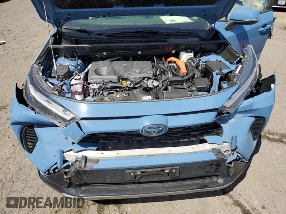 2024 Toyota RAV4 Hybrid SE with VIN JTM16RFV6RD147620, listed as a Copart auction lot 54415215 with 5,705 mi miles and Salvage title. Bid and sale history available at DreamBid. Image 12.