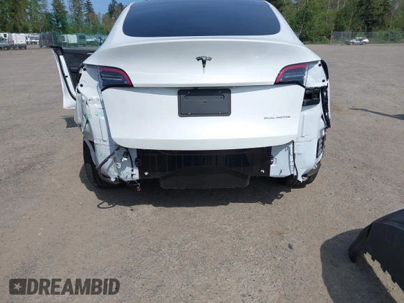 2023 Tesla Model Y Long Range with VIN 7SAYGDEE4PF676167, listed as a IAAI auction lot 42147909 with 20,488 mi miles. Bid and sale history available at carsss.com. Image 6.