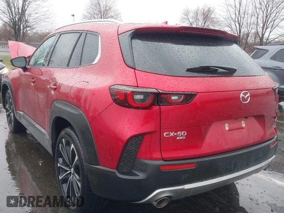 2025 Mazda CX-50 Premium z VIN 7MMVABDY3SN329439, wystawiony jako IAAI lot #41867334 z przebiegiem 3 508 mil mil oraz . Historia ofert i sprzedaży dostępna na DreamBid. Obrazek 3.