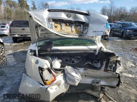 2004 Cadillac DeVille DTS z VIN 1G6KF57964U242365, wystawiony jako Copart lot #41645555 z przebiegiem Nie podano mil oraz Szkody całkowita. Historia ofert i sprzedaży dostępna na DreamBid. Obrazek 6.