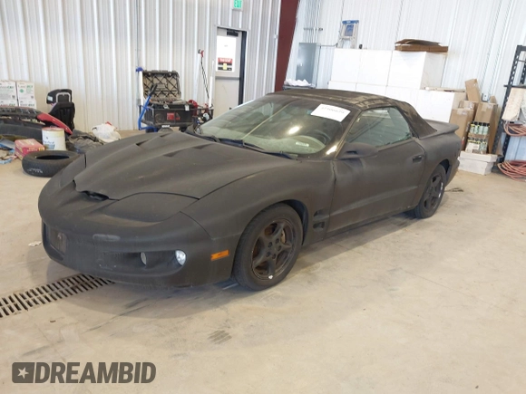 2000 Pontiac Firebird Firebird z VIN 2G2FS32KXY2146392, wystawiony jako IAAI lot #42506629 z przebiegiem 161 077 mil mil oraz . Historia ofert i sprzedaży dostępna na DreamBid. Obrazek 2.