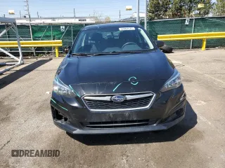 2018 Subaru Impreza z VIN 4S3GTAA61J3720731, wystawiony jako Copart lot #52864575 z przebiegiem 74 634 mil mil oraz Szkoda całkowita • Salvage title. Historia ofert i sprzedaży dostępna na DreamBid. Obrazek 5.
