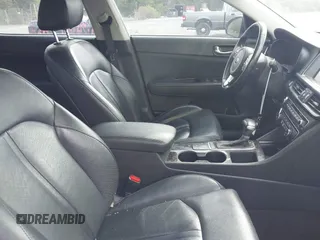 2018 Kia Optima EX with VIN 5XXGU4L34JG237557, listed as a IAAI auction lot 42000008 with 128,694 mi miles and . Bid and sale history available at carsss.com. Image 5.