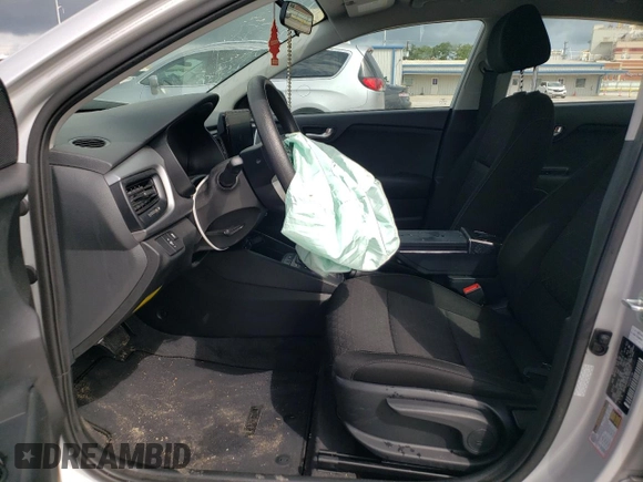 2022 Kia Rio LX with VIN 3KPA24AD2NE506127, listed as a Copart auction lot 63672404 with Not Provided miles and Salvage Title. Bid and sale history available at DreamBid. Image 7.