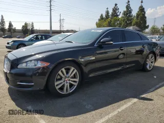 2014 Jaguar XJ Portfolio with VIN SAJWA2GZ6E8V59179, listed as a Copart auction lot 59686215 with 166,974 mi miles and Clean title. Bid and sale history available at DreamBid. Image 1.