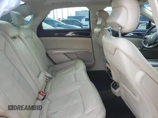 2015 Lincoln MKZ Hybrid with VIN 3LN6L2LU9FR600936, listed as a Copart auction lot 51903545 with 77,155 mi miles and Salvage Title. Bid and sale history available at carsss.com. Image 10.