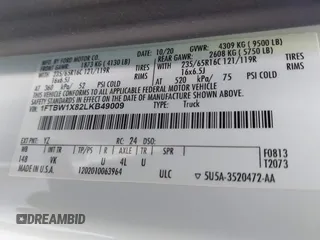 2020 Ford Transit Cargo with VIN 1FTBW1X82LKB49009, listed as a IAAI auction lot 41527513 with 52,802 mi miles and . Bid and sale history available at DreamBid. Image 9.