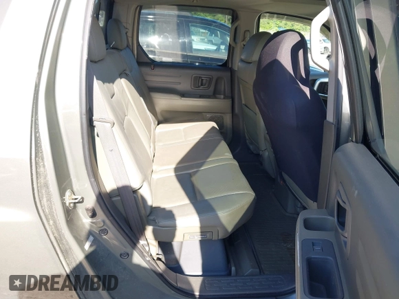 2007 Honda Ridgeline RTL z VIN 2HJYK16537H530129, wystawiony jako IAAI lot #42191209 z przebiegiem 181 686 mil mil oraz . Historia ofert i sprzedaży dostępna na DreamBid. Obrazek 8.