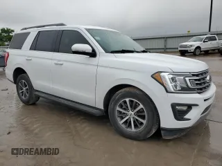 2019 Ford Expedition XLT with VIN 1FMJU1HTXKEA39774, listed as a Copart auction lot 51450225 with 98,790 mi miles and Salvage Title. Bid and sale history available at carsss.com. Image 4.