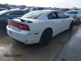 2011 Dodge Charger RT Plus with VIN 2B3CM5CT9BH591577, listed as a IAAI auction lot 41502815 with 126,750 mi miles. Bid and sale history available at carsss.com. Image 4.
