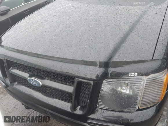 2005 Ford Explorer Sport Trac XLS z VIN 1FMZU77K35UB14856, wystawiony jako IAAI lot #42576244 z przebiegiem Nie podano mil oraz . Historia ofert i sprzedaży dostępna na DreamBid. Obrazek 10.