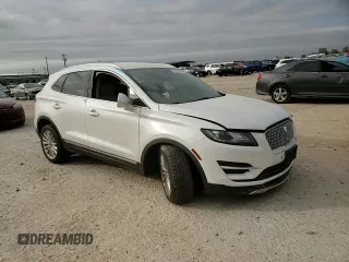 2019 Lincoln MKC Standard with VIN 5LMCJ1D95KUL45392, listed as a Copart auction lot 82561394 with 104,748 mi miles and Salvage Title. Bid and sale history available at DreamBid. Image 10.