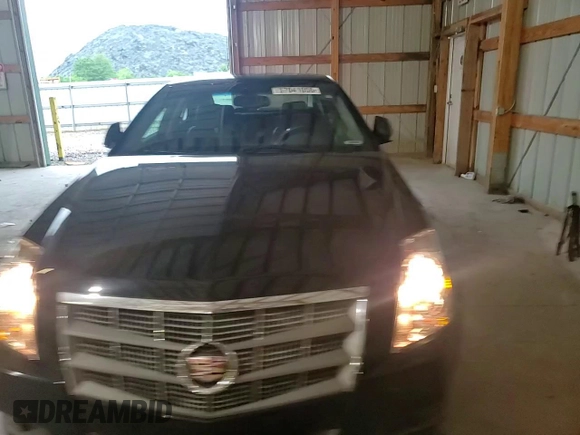 2009 Cadillac CTS RWD с VIN 1G6DF577590169740, выставлен на аукционе Copart как лот 57041055 с пробегом 68 857 миль миль и Списание • Salvage title. История ставок и продаж доступна на DreamBid. Изображение 13.