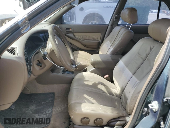 1996 Toyota Camry LE with VIN 4T1BF12K4TU870788, listed as a Copart auction lot 75050564 with 245,619 mi miles and Non repairable. Bid and sale history available at DreamBid. Image 7.