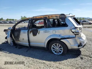 2014 Dodge Journey SXT z VIN 3C4PDDBG3ET178595, wystawiony jako Copart lot #56893275 z przebiegiem Nie podano mil oraz Szkoda całkowita • Salvage title. Historia ofert i sprzedaży dostępna na DreamBid. Obrazek 2.