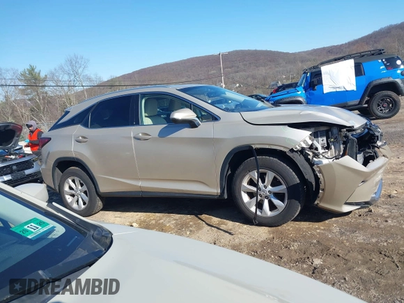 2016 Lexus RX 450h z VIN 2T2BGMCA7GC007006, wystawiony jako IAAI lot #41999343 z przebiegiem 124 912 mil mil oraz . Historia ofert i sprzedaży dostępna na DreamBid. Obrazek 13.