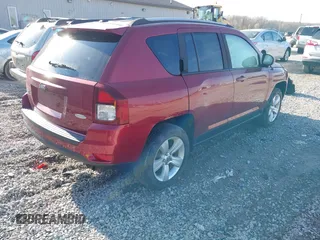 2016 Jeep Compass Latitude with VIN 1C4NJDEBXGD619261, listed as a IAAI auction lot 41991853 with 107,023 mi miles and . Bid and sale history available at DreamBid. Image 4.