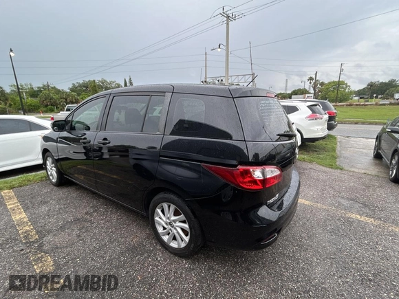 2015 Mazda 5 Sport z VIN JM1CW2BLXF0182880, wystawiony jako Copart lot #56959895 z przebiegiem 117 395 mil mil oraz Czysty tytuł • Clean title. Historia ofert i sprzedaży dostępna na DreamBid. Obrazek 3.