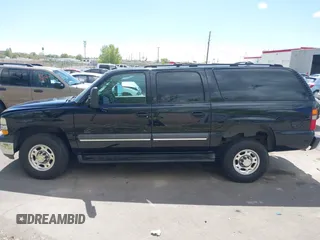 2003 Chevrolet Suburban LT z VIN 3GNGC26G83G210035, wystawiony jako IAAI lot #42084859 z przebiegiem 145 919 mil mil oraz . Historia ofert i sprzedaży dostępna na DreamBid. Obrazek 14.