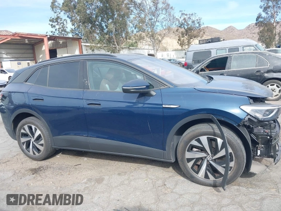 2023 Volkswagen ID.4 Pro z VIN 1V2DNPE8XPC019169, wystawiony jako IAAI lot #41313501 z przebiegiem 32 552 mil mil oraz . Historia ofert i sprzedaży dostępna na DreamBid. Obrazek 14.